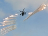 Ka-52 ‘89 Red’/RF-13428 fires a volley of IRCM flares