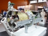 A cutaway TR-1 turbojet, with the bust of Arkhip M. Lyul’ka in the background
