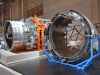 A PD-14 engine on a ground handling dolly, with the thrust reverser assembly in the foreground